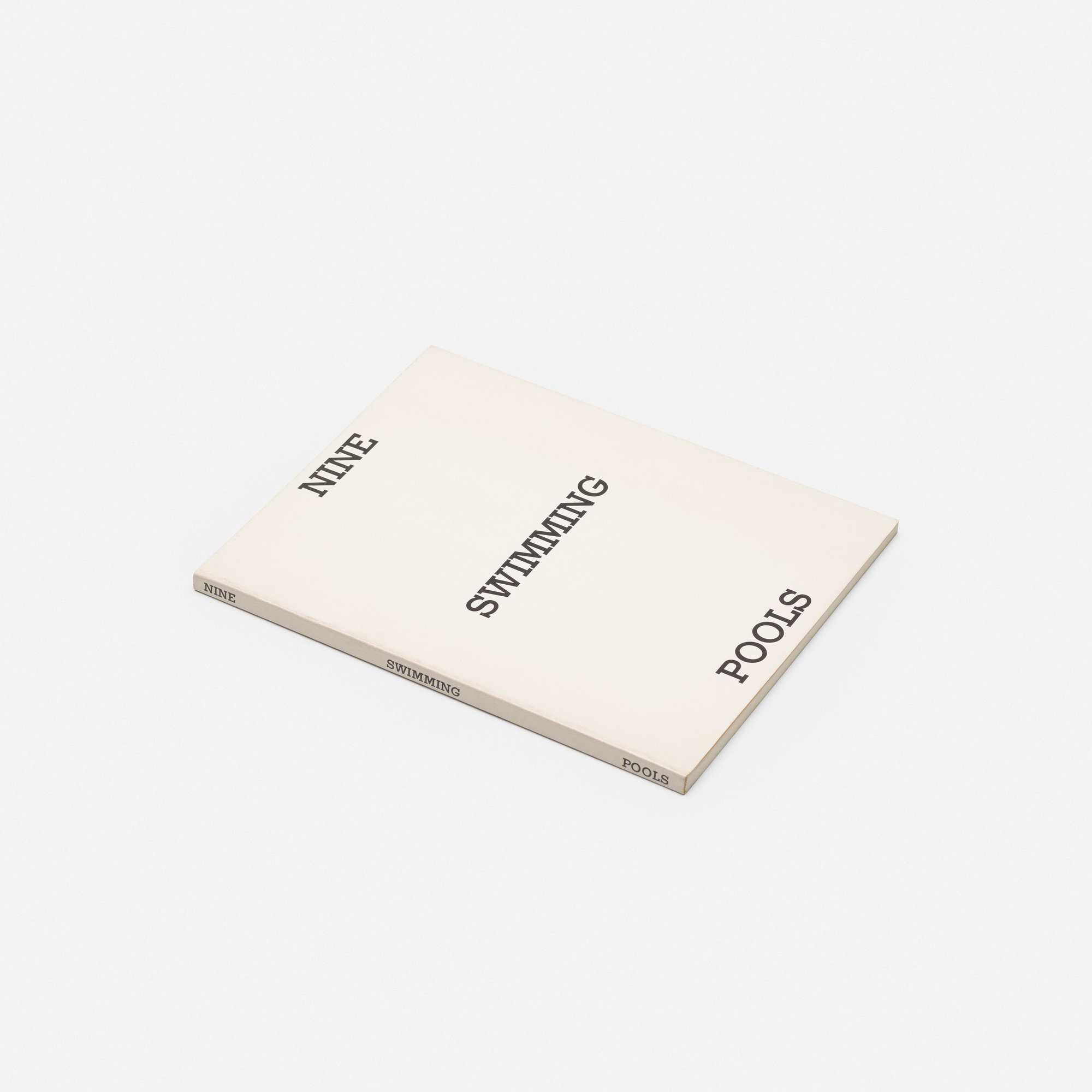 Nine Swimming Pools and a Broken Glass